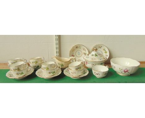 A collection of early 19th century Newhall teawares, pattern number 3499 with painted and gilded floral sprigs, comprising a 