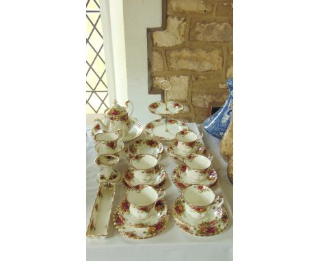 A quantity of Royal Albert Old Country Roses pattern teawares comprising a two tier cake stand, teapots, milk jug, sugar bowl