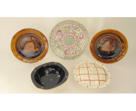 A Bursley ware  Art Deco charger designed by Charlotte Rhead with stylised floral decoration in tones of pink, blue, yellow a