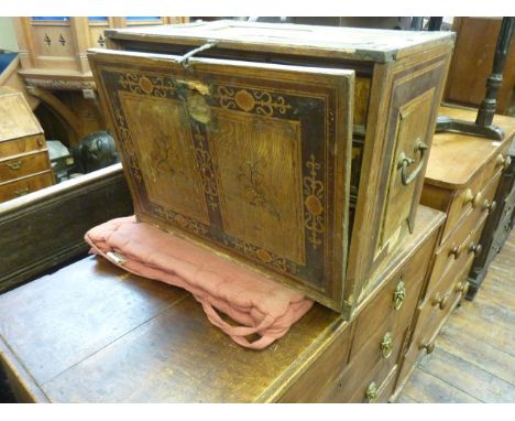 An 18th century continental table cabinet, fall front with marquetry detail showing birds amongst blossom on ashwood backgrou