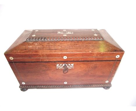 A fine 19th century rosewood veneered sarcophagus shaped tea caddy, the exterior decorated with mother-of-pearl inlay to incl