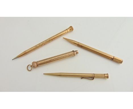 A gold-plated propelling pencil, W.S. Hicks, New York, with engine-turned decoration; a gold-plated pencil, Eversharp, U.S.A.