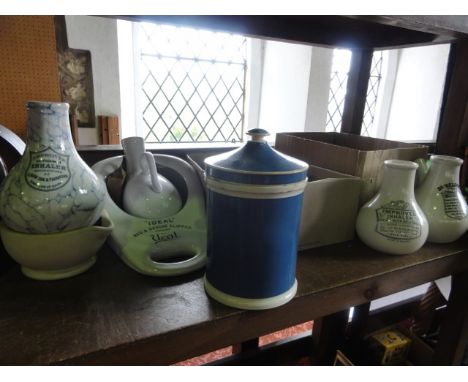 A collection of 19th century and other invalid feeding cups including blue and white printed example, floral examples, etc to
