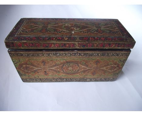 A Kashmir timber caddy/box of rectangular form with elaborately detailed hand painted floral and other decoration in a variet