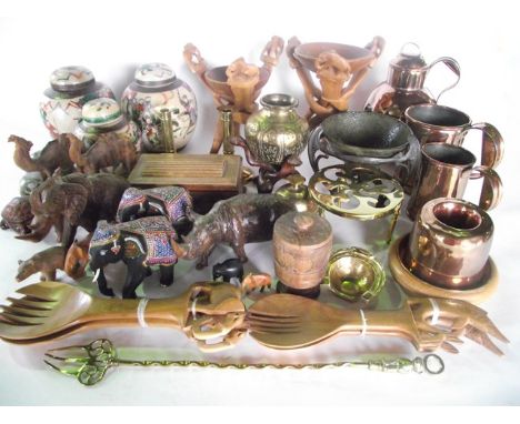 A selection of decorative carved treen to include models of rhino, painted elephants, etc together with a quantity of metalwo