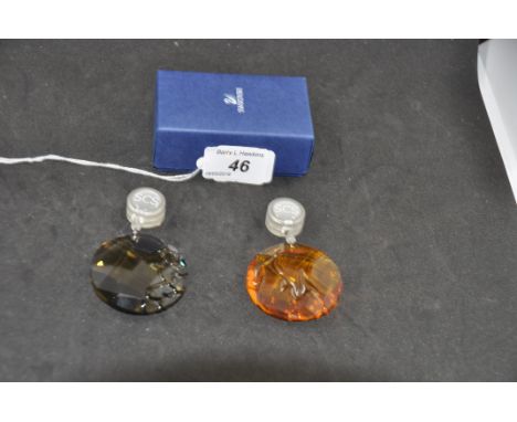 SWAROVSKI CRYSTAL WINDOW ORNAMENTS - 2008 BAMBOO - GREEN (905542)  AND 2010 FIRE - LIGHT TOPAZ (1017151), BOTH BOXED WITH CER