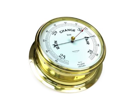 A MODERN SHIP'S SESTREL BAROMETER, with white enamel dial, 28cm diameter