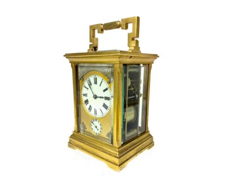 VICTORIAN GILTMETAL CARRIAGE CLOCK, with two train movement, the white enamel dial with Roman numerals, subsidiary seconds di