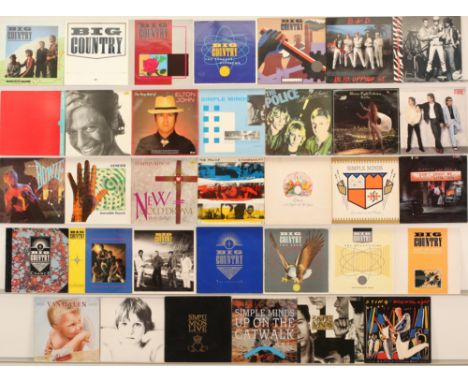 A collection of Mixed Genre Rock LPs and 12" to include artists; Van Halen, Big Country, Queen, Elton John, David Bowie, The 
