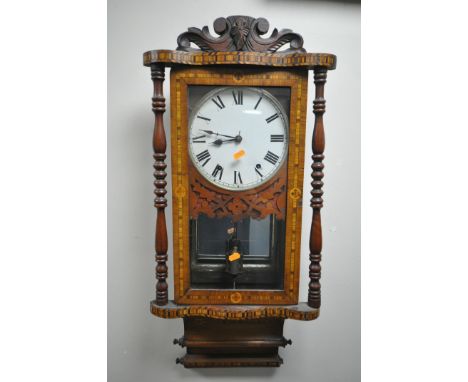 A 19TH CENTURY AMERICAN WALNUT AND INLAID WALL CLOCK, the enamel dial with Roman numerals, with a pendulum, height 83cm (cond