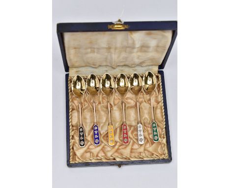 A CASED SET OF SIX SILVER GILT AND ENAMEL HARLEQUIN COFFEE SPOONS, marked 'Ela DENMARK STERLING 925S', each spoon handle enam