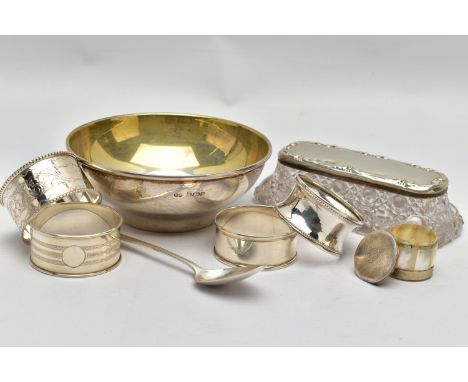 AN ELIZABETH II SILVER CIRCULAR BOWL, FOUR SILVER NAPKIN RINGS, ETC, the bowl with gilt interior, plain exterior, maker RS, B