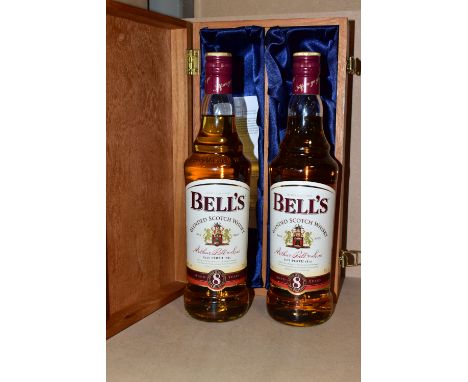 WHISKY, two bottles of BELL'S Blended Scotch Whisky  aged 8 years, 40% vol, 70cl, fill levels mid neck, seals intact, in a wo
