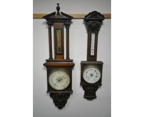 AN EARLY 20TH CENTURY CARVED OAK BAROMETER, with mercury door and thermometer, unsigned, height 125cm and an aneroid baromete