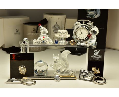 FOUR BOXED SWAROVSKI CRYSTAL ORNAMENTS, comprising Birthday Cake - 5th SCS Anniversary (169678) 1992, designed by Gabriele St
