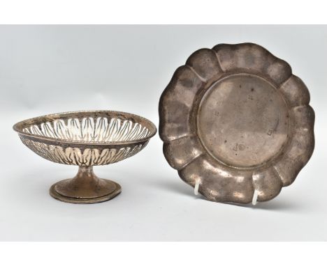 AN ELIZABETH II SILVER DISH OF WAVY OUTLINE AND A GEORGE V PIERCED SILVER PEDESTAL DISH, the wavy dish with large hallmarks t