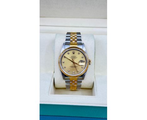 ROLEX BRAND MODEL (WATCH) DATEJUST 36 REFERENCE NUMBER 16233 DIAL WITH DIAMONDS AUTOMATIC CHARGING CASE MATERIAL GOLD/STEEL S