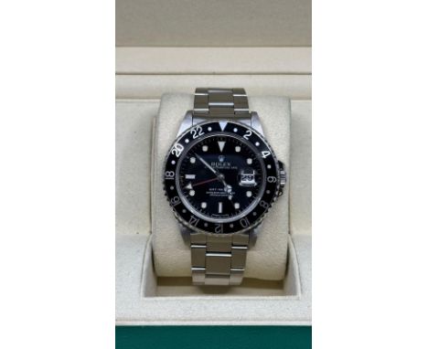 ROLEX BRAND MODEL (WATCH) GMT-MASTER II REFERENCE NUMBER 16700 AUTOMATIC CHARGING CASE MATERIAL STEEL STRAP MATERIAL STEEL CO