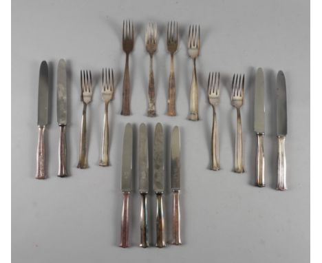 A GROUP OF FOREIGN AND PLATED TABLE FLATWARE (QTY)The 800 detailed flatware comprising; five table forks, five tablespoons, f