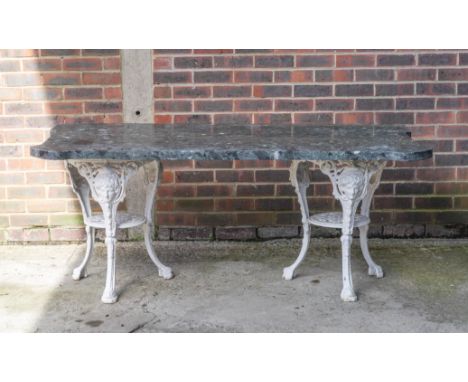 A PAIR OF LATE 19TH CENTURY COMMODE MARBLE TOPS (6)173cm wide; 84cm deep, each with a pair of later white painted cast iron B