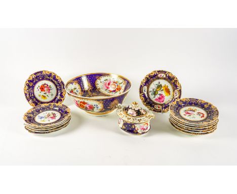 A GROUP OF ENGLISH BLUE-GROUND PORCELAINS PAINTED WITH FLOWERS (16)Circa 1825 Comprising; eleven Ridgway's `733' pattern dess