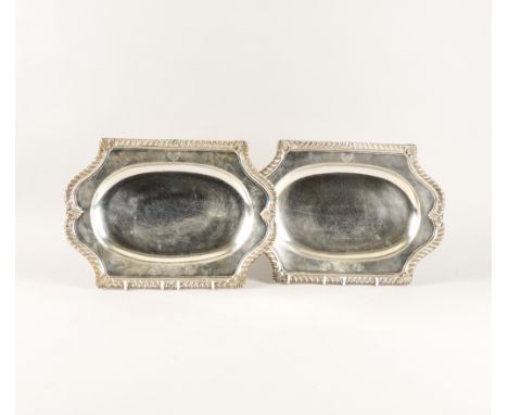 A PAIR OF PAUL DE LAMERIE SILVER SHAPED RECTANGULAR FIRST COURSE DISHESEach with a recessed oval centre, the shaped surround 