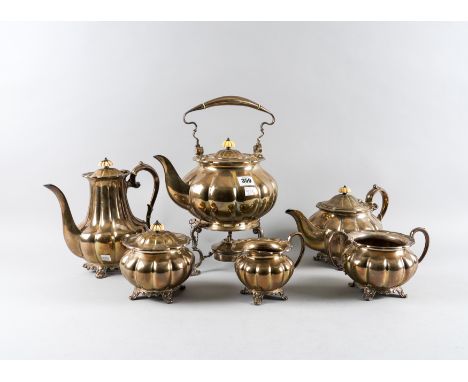 A SILVER SIX PIECE TEA AND COFFEE SET (6)Comprising; a teapot, a coffee pot, a spirit kettle with stand and unmarked spirit b