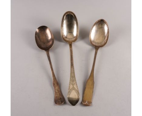 THREE LARGE BASTING SPOONS (3)All probably European, comprising; a fiddle pattern marked twice G K, length 37cm, a stylized O