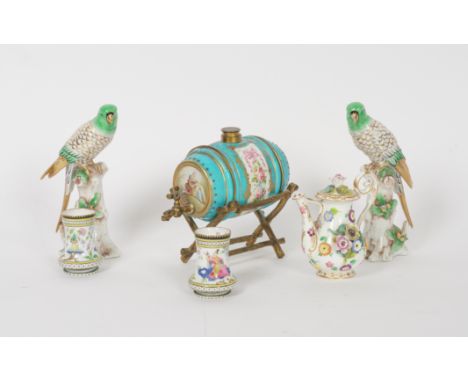 A GROUP OF CONTINENTAL AND ENGLISH PORCELAINS (9)19th and 20th century Comprising; a small Sevres style spirit barrel and gil