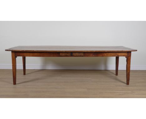 AN EARLY 19TH CENTURY FRENCH PLANK TOP MAHOGANY AND FRUITWOOD KITCHEN TABLE80cm wide; 260cm long; 74cm highOld marks and scra