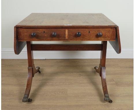 A REGENCY SATINWOOD BANDED ROSEWOOD SOFA TABLE77cm wide; 131cm wide open; 59cm deep; 72cm high