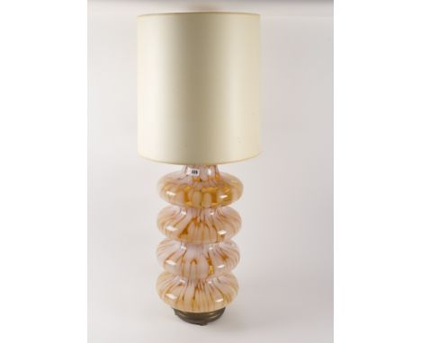 ATTRIBUTED TO CARLO NASON FOR MEZZEGA: A MURANO GLASS AMBER AND MILK GLASS TIERED TABLE LAMP1960’s
The four tiered amber glas