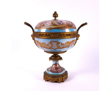 A SEVRES STYLE GILT-METAL MOUNTED TWO- HANDLED FOOTED BOWL AND COVER (2)Late 19th century The bowl painted with gilt foliate 