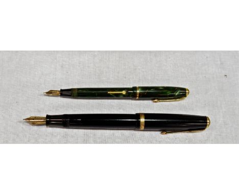 A Parker ''Duofold'' fountain pen; a Conway Stewart ''Dinky 550'' fountain pen 