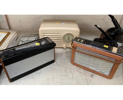 A Champion white bakelite vintage mains radio; Robert's transistor radio and a Bush radio circa 1960's 