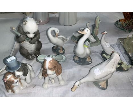 Two Lladro porcelain geese and 6 NAO porcelain animal figures 