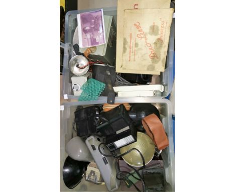 A large selection of vintage camera flashes, polaroid etc 