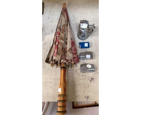 A vintage table lighter and 4 others; a vintage parasol and 1930's chiming mantle clock 