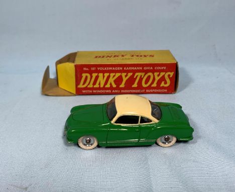 A Dinky Toys originally boxed diecast vehicle 187 Volkswagen Karmann Ghia coupe in green and cream (box worn) 