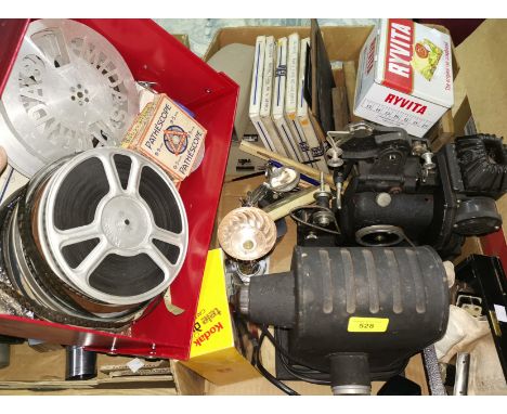 A vintage Pathe projector and a selection of vintage reels etc 