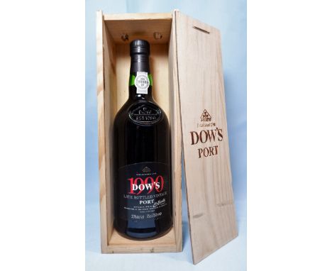 A bottle of Dow's 1990 late bottle vintage port in wooden case 750ml 20% alcohol 