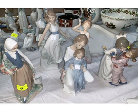 A NAO porcelain figure of a goose girl and 4 other similar figures 