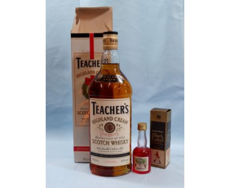 A single bottle of Teacher's Highland Cream Scotch Whiskey in Christmas presentation box; 2 miniatures and contents 