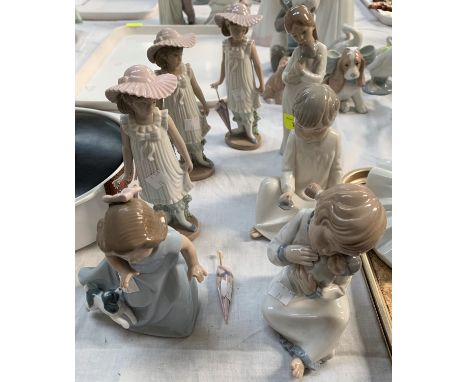 Seven NAO porcelain figures 
