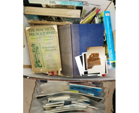A collection of vintage camera instruction manuals and various vintage texts on photography 