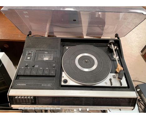 A Grundig Studio 3010 record player on stand 
