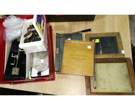 A No 2 Kodak trimming board, another and a selection of vintage camera equipment 