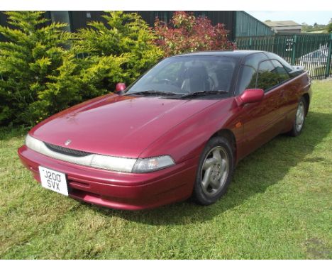 A 1991 Subaru SVX, registration number J200 SVX, red. This rare import was manufactured in 1991 and registered in 2003 in the