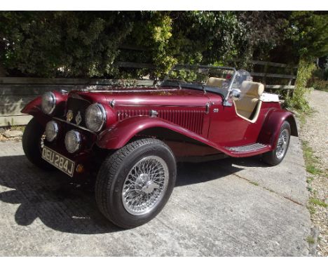 A 1971 NG TF 1800, registration number OEU 284J, maroon. This beautifully presented modern interpretation of the MG TF is bas