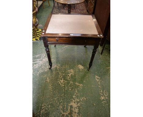 A Victorian mahogany office table, rectangular top, drawer to frieze, button handles, turned legs, ceramic casters. 77cm high